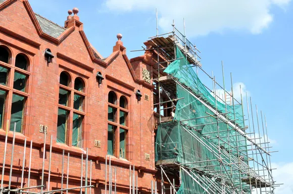 A professional brick building renovation project in Chicago.
